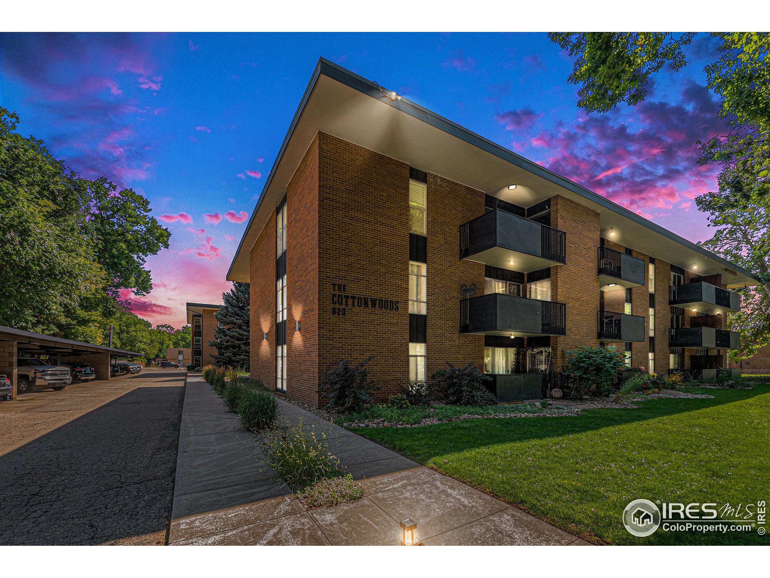 620 Mathews Street, Unit 104 Fort Collins, CO 80524 - Photo 32 of 32 a view of a house with a yard