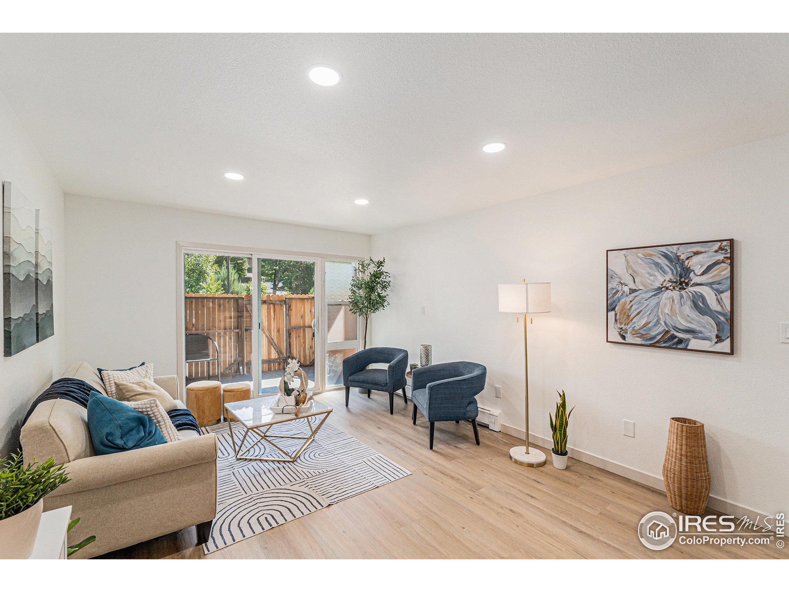 620 Mathews Street, Unit 104 Fort Collins, CO 80524 - Photo 7 of 32 a living room with furniture