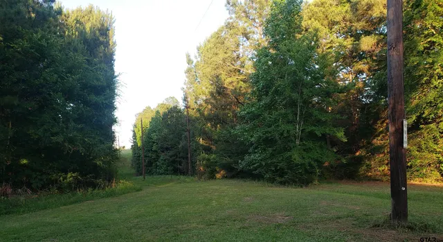 a kitchen with a sink and large window