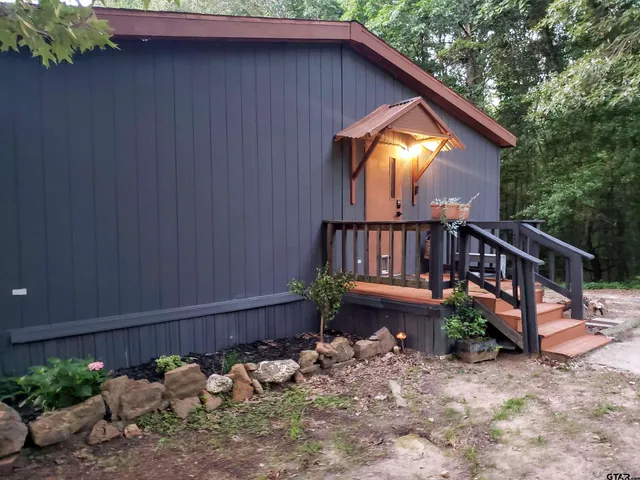 a front view of house with yard