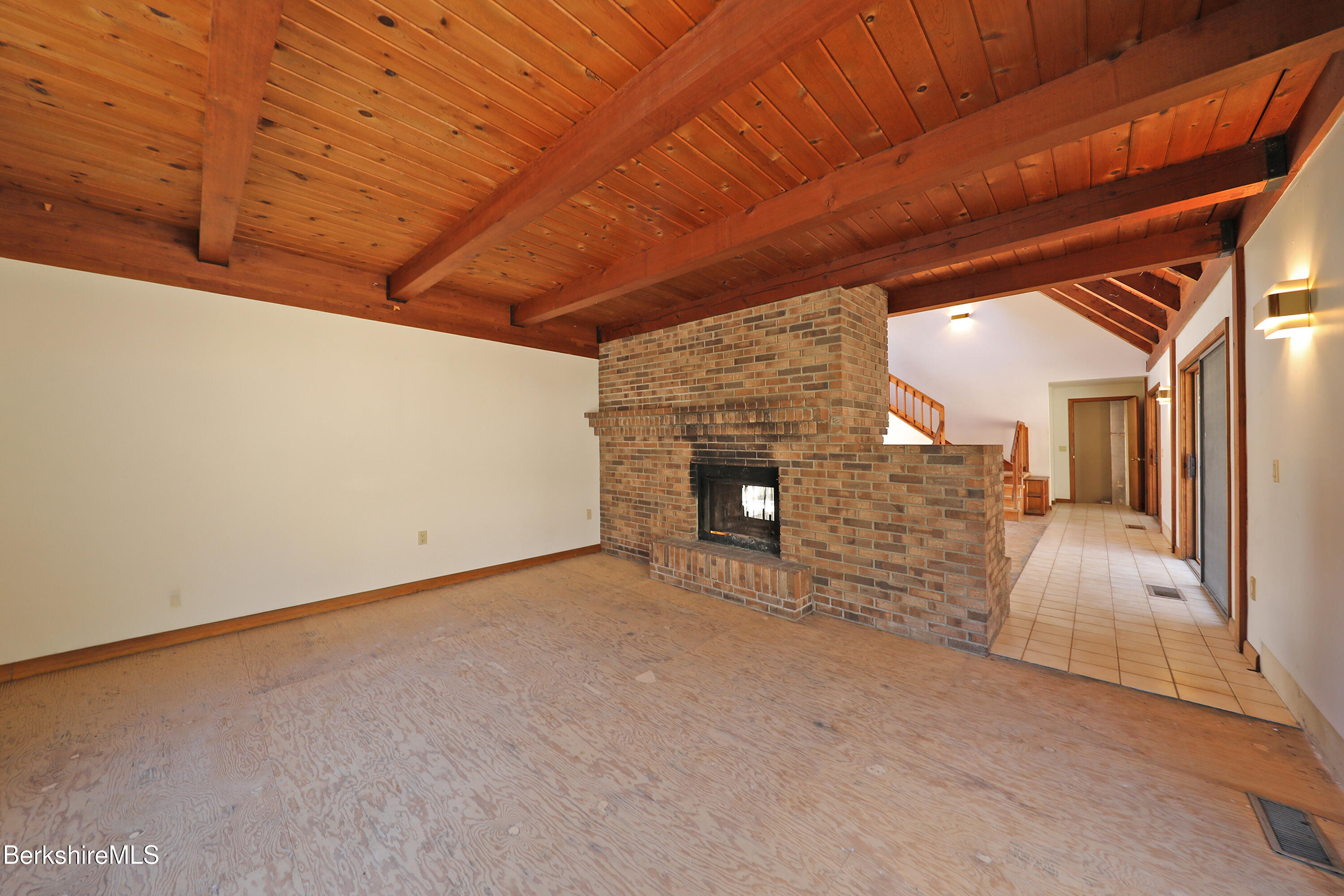 519 Kirchner Road Dalton, MA 01226 - Photo 18 of 42 a view of an empty room with a fireplace