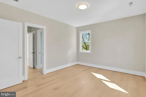a view of an empty walk in closet