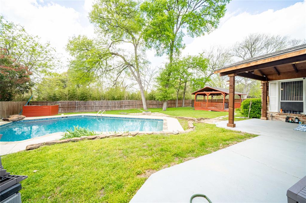 919 Green Hills Road Duncanville, TX 75137 - Photo 32 of 37 View of pool featuring a gazebo and a patio area