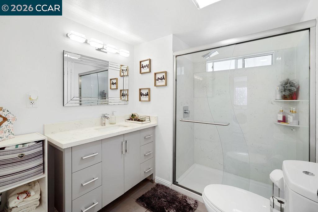 3301 Buchanan Road, Unit 85 Antioch, CA 94509 - Photo 11 of 26 a bathroom with a sink a toilet and shower