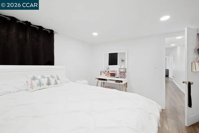 a front view of a house with a yard and outdoor seating