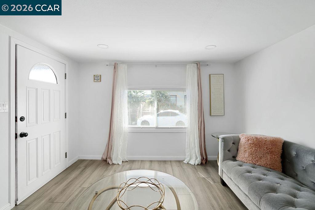 3301 Buchanan Road, Unit 85 Antioch, CA 94509 - Photo 3 of 26 a living room with furniture and a flat screen tv