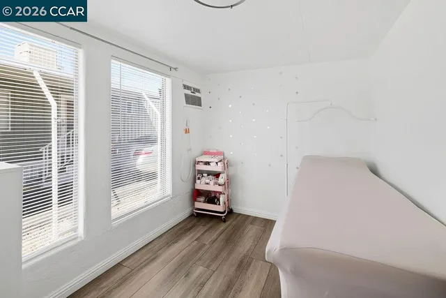 a view of a storage & utility room with a window