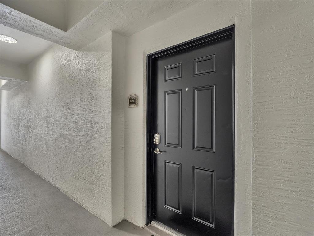 1660 Renaissance Commons Boulevard, Unit 2628 Boynton Beach, FL 33426 - Photo 17 of 49 a view of a hallway