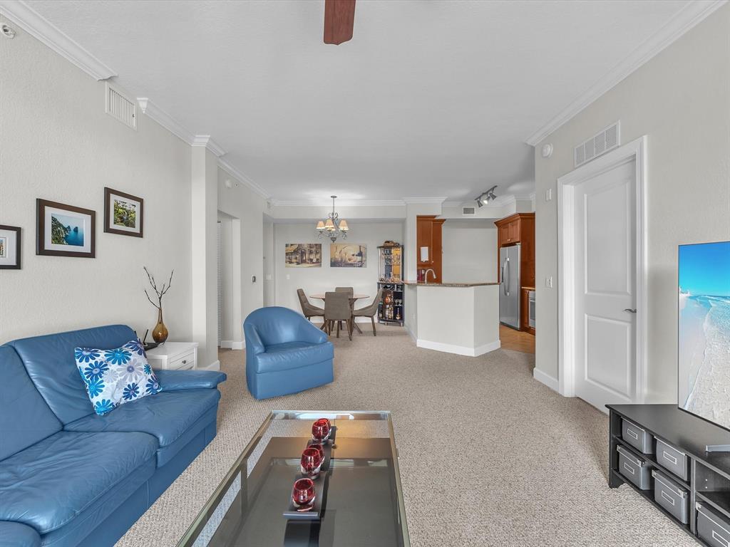 1660 Renaissance Commons Boulevard, Unit 2628 Boynton Beach, FL 33426 - Photo 25 of 49 a living room with furniture and a couch