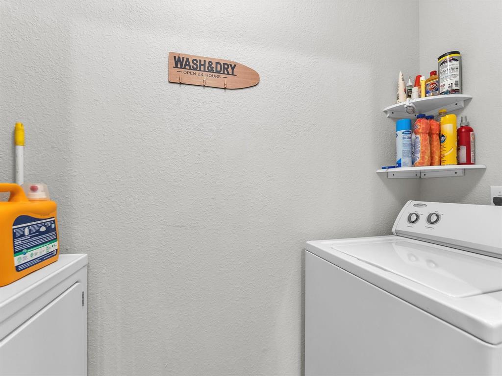 1660 Renaissance Commons Boulevard, Unit 2628 Boynton Beach, FL 33426 - Photo 27 of 49 a utility room with dryer and washer