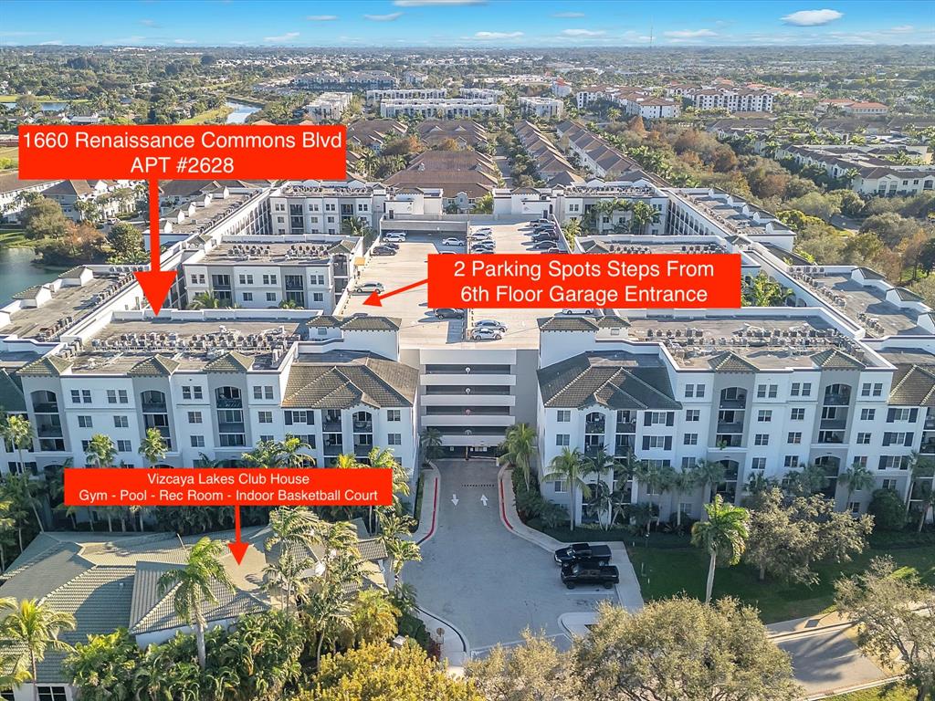 1660 Renaissance Commons Boulevard, Unit 2628 Boynton Beach, FL 33426 - Photo 29 of 49 an aerial view of residential houses with outdoor space and swimming pool