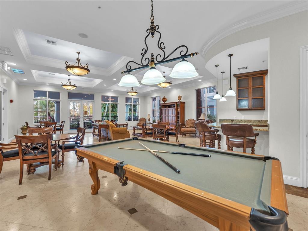1660 Renaissance Commons Boulevard, Unit 2628 Boynton Beach, FL 33426 - Photo 32 of 49 a view of a dining room with furniture