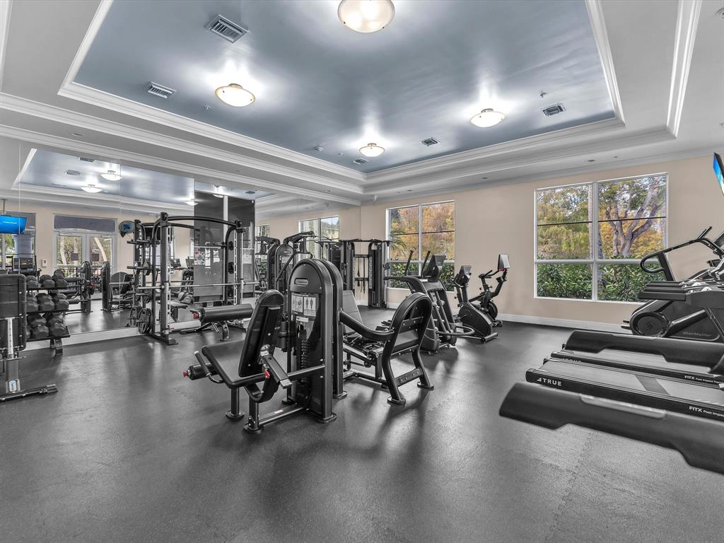 1660 Renaissance Commons Boulevard, Unit 2628 Boynton Beach, FL 33426 - Photo 38 of 49 a view of a room with gym equipment