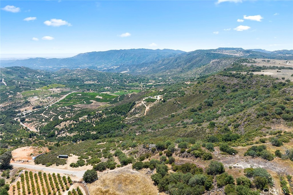 15 Vía Escalon Temecula, CA 92590 - Photo 2 of 42 a view of a mountain in the distance in a field