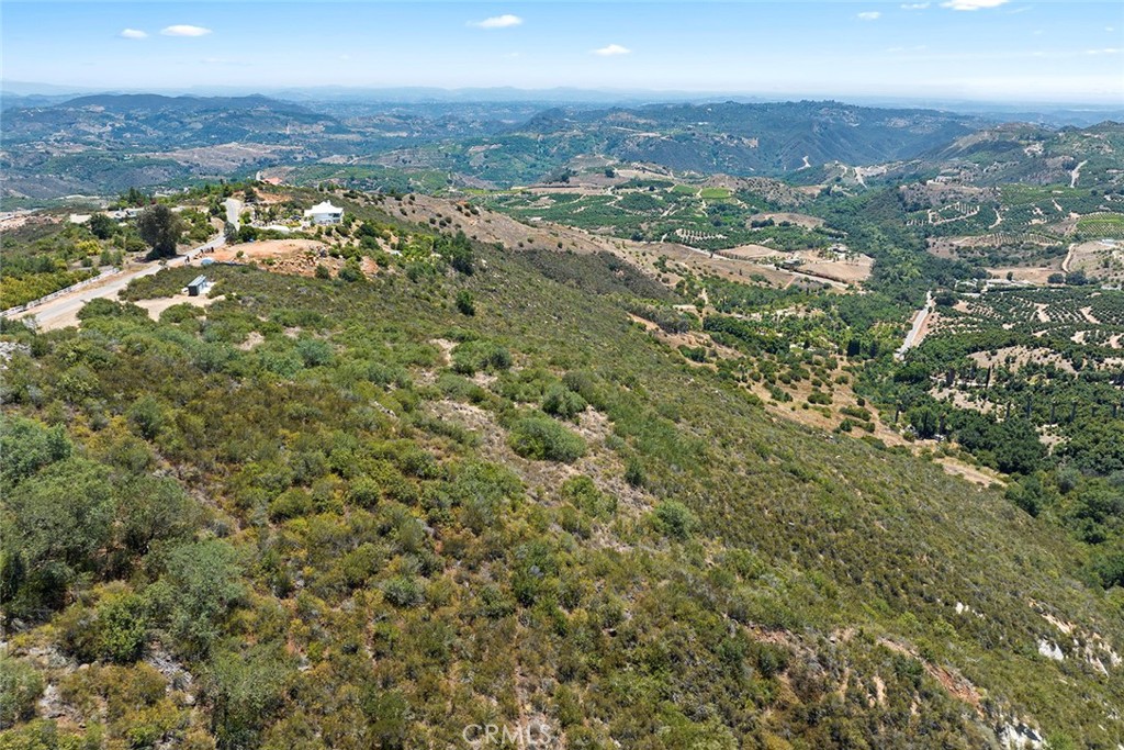 15 Vía Escalon Temecula, CA 92590 - Photo 37 of 42 an aerial view of residential houses with city view