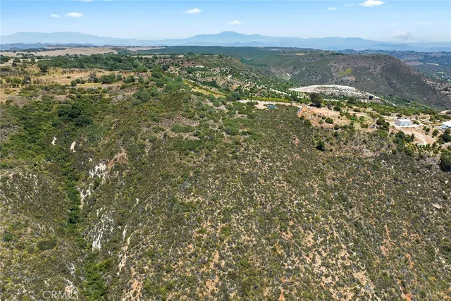 a view of a city and mountains