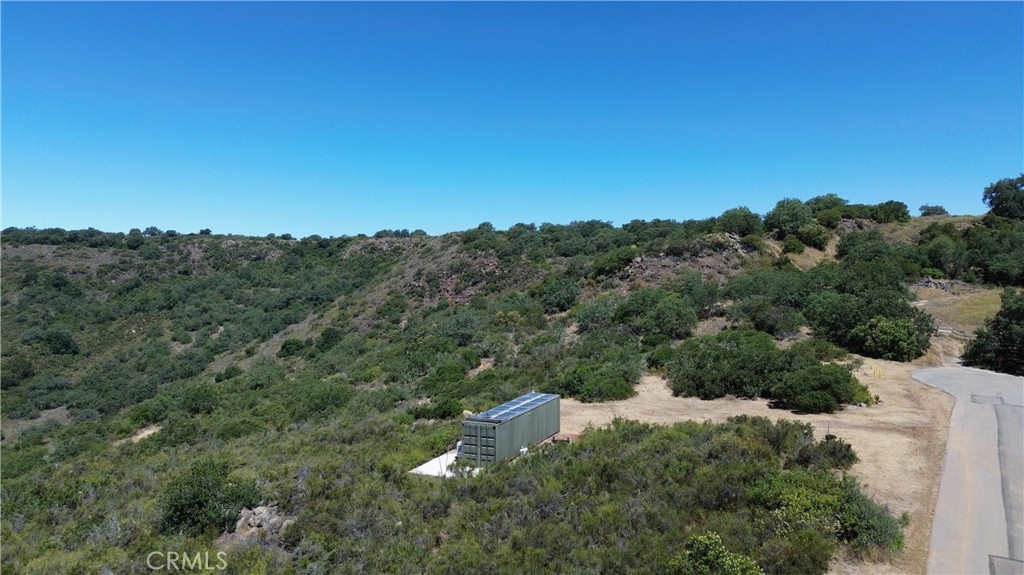 15 Vía Escalon Temecula, CA 92590 - Photo 6 of 42 an aerial view of a house with mountain view