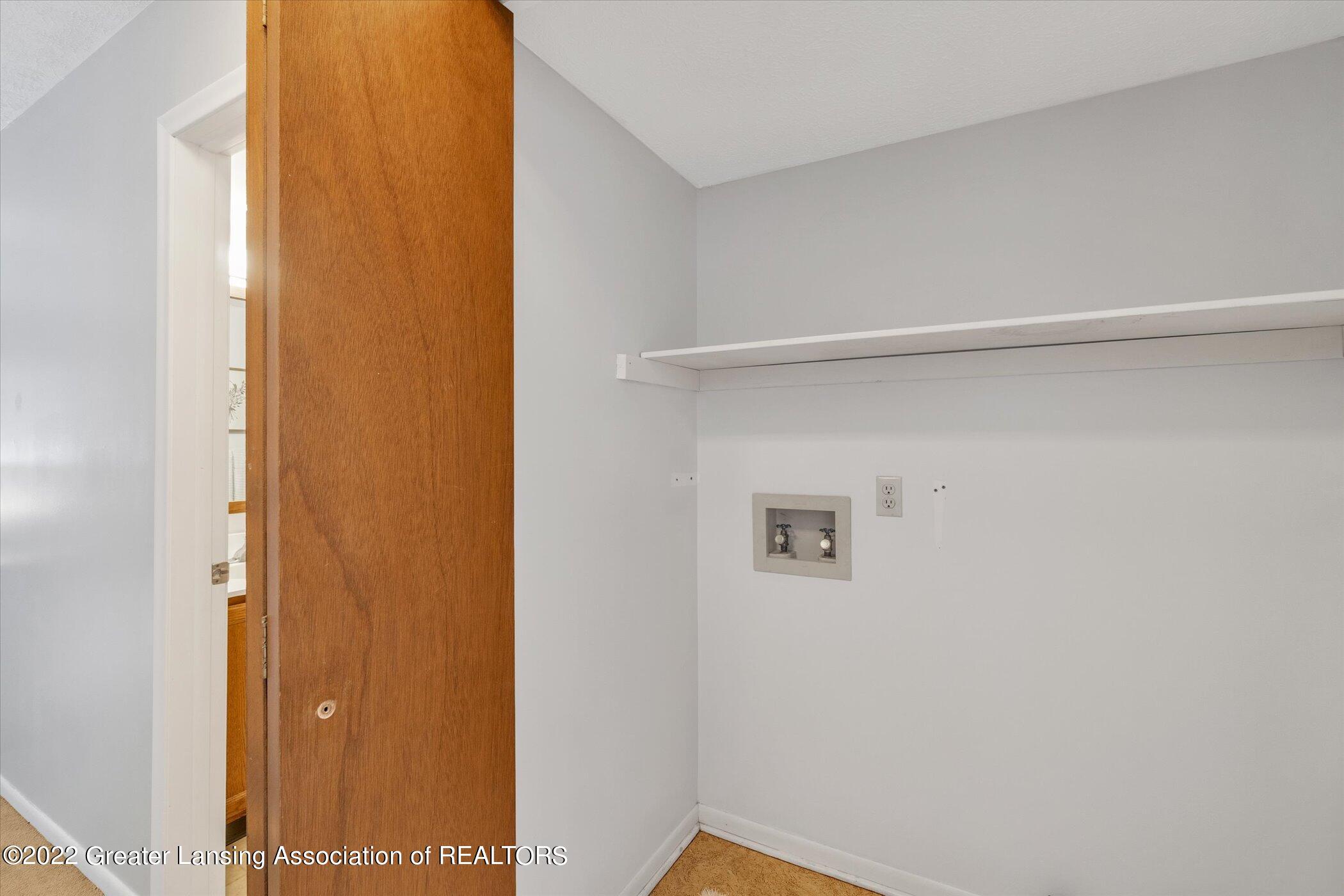 215 East Jolly Road, Unit G6 Lansing, MI 48910 - Photo 14 of 15 Laundry closet
