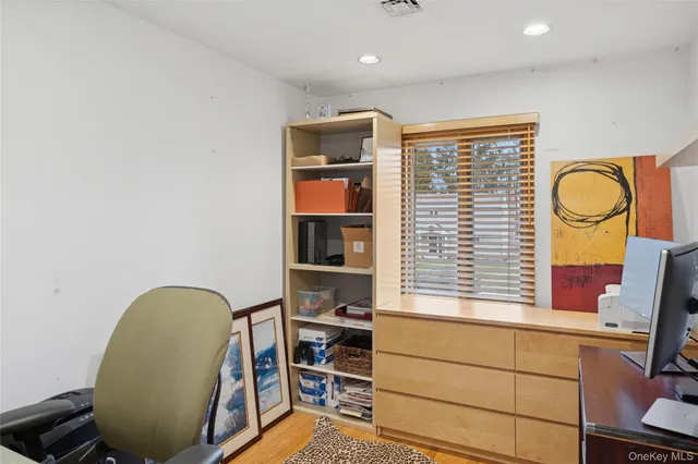 a bathroom with a sink toilet tub and shower