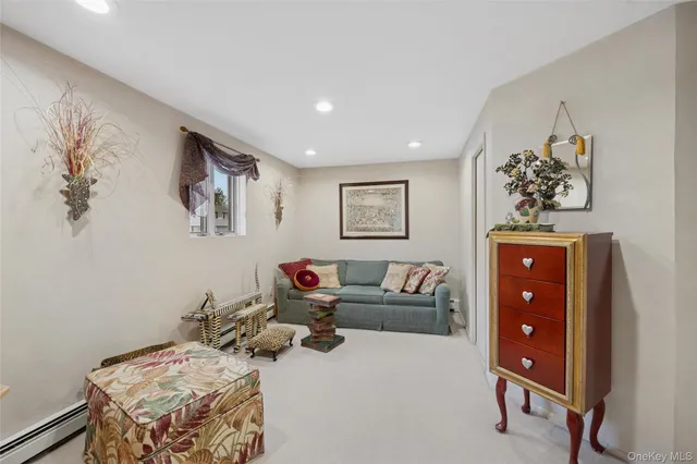a view of a livingroom with wooden floor and closet