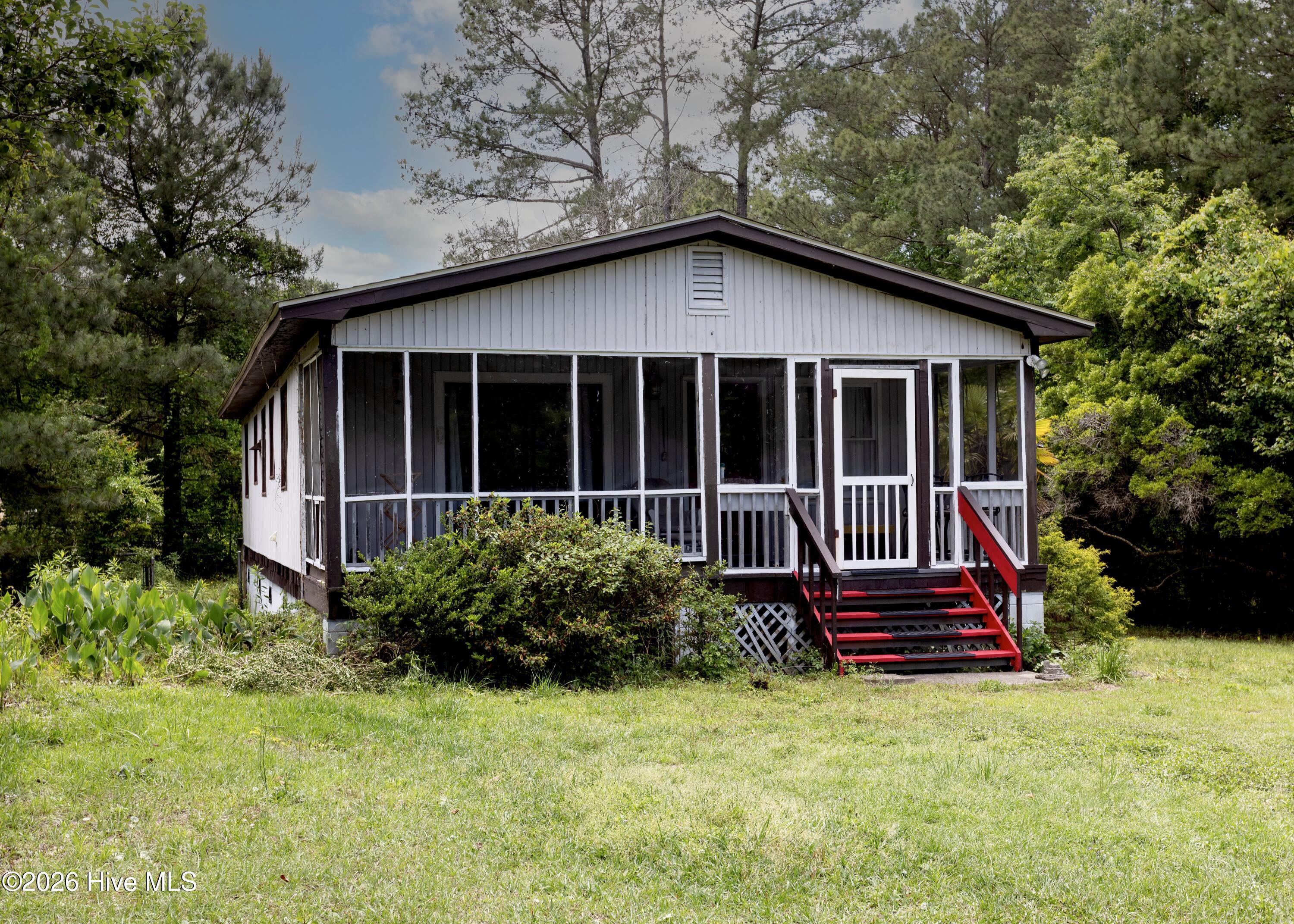 408 Old Folkstone Road Holly Ridge, NC 28445 - Photo 3 of 22 a front 3