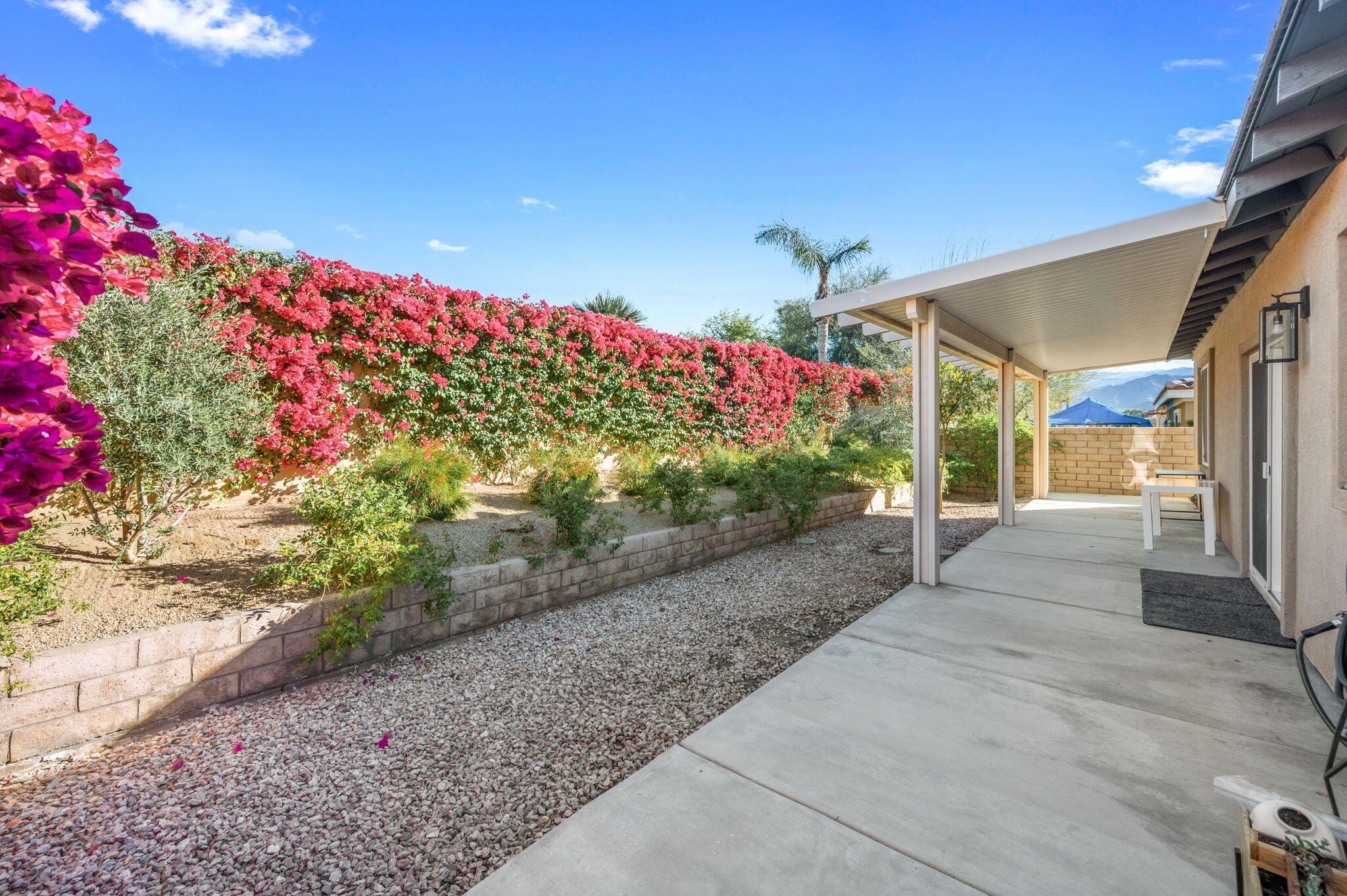 40 Shoreline Drive Rancho Mirage, CA 92270 - Photo 31 of 33 a view of a porch and flowers