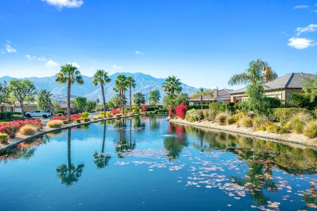 a front view of a house with lake view