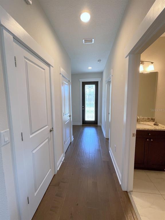 2411 West North A Street, Unit 2 Tampa, FL 33609 - Photo 2 of 19 a view of hallway with wooden floor