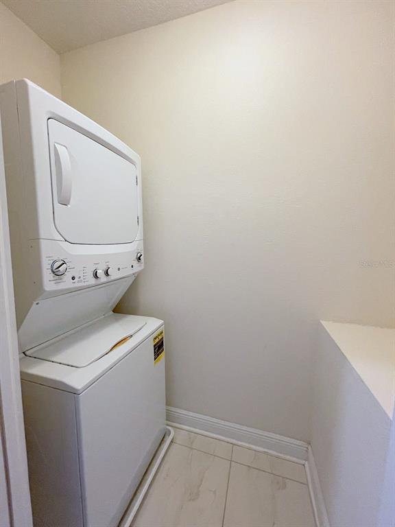 2411 West North A Street, Unit 2 Tampa, FL 33609 - Photo 9 of 19 a utility room with dryer and washer