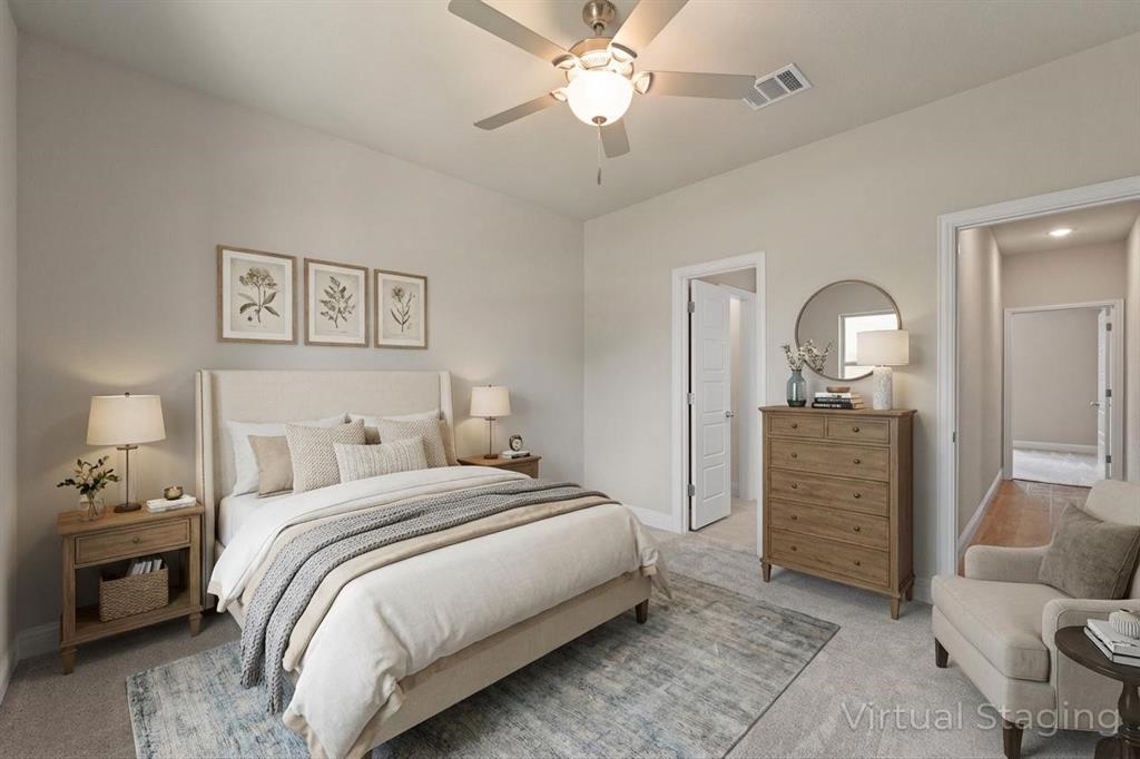 1001 Resolute Road Millsap, TX 76066 - Photo 24 of 40 a bedroom with a bed and a chandelier