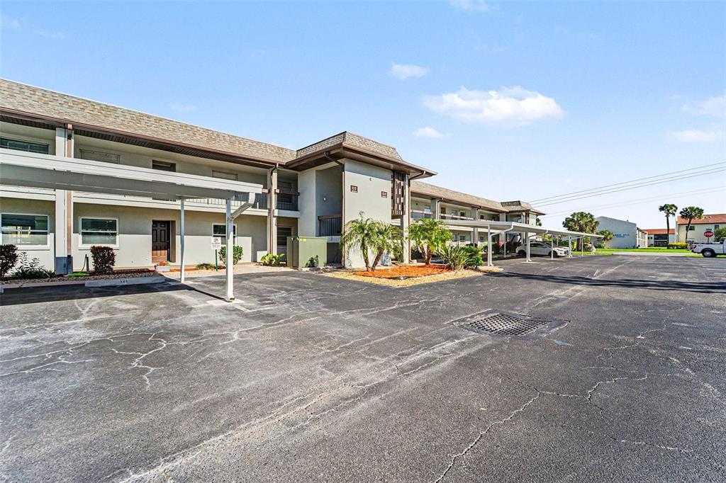 5197 Silent Loop, Unit 121 New Port Richey, FL 34652 - Photo 1 of 36 a view of road with card board