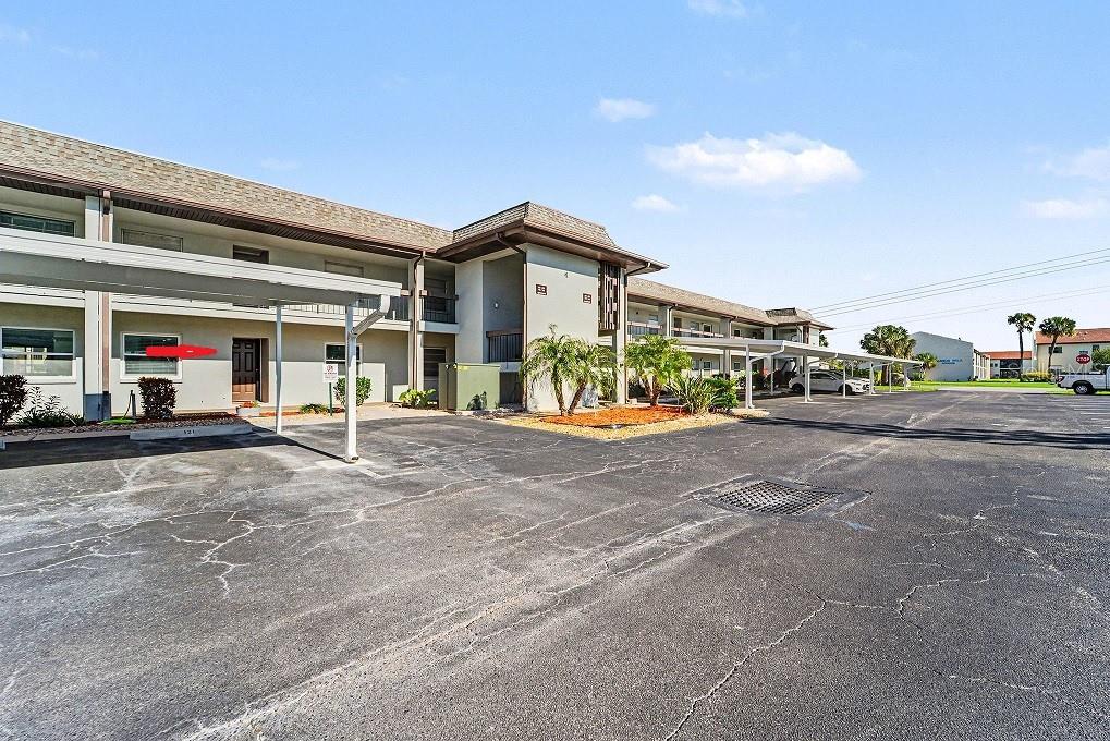 5197 Silent Loop, Unit 121 New Port Richey, FL 34652 - Photo 2 of 36 a view of street with cars