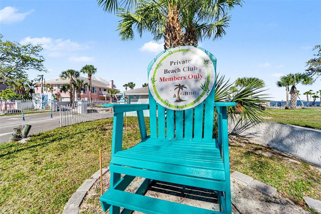 5197 Silent Loop, Unit 121 New Port Richey, FL 34652 - Photo 30 of 36 a view of a swimming pool with a table and chairs