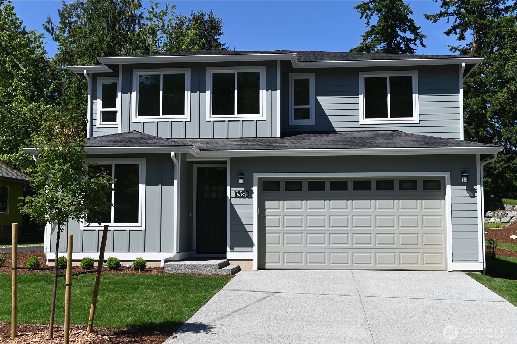1323 Roland Street Bellingham, WA 98229 - Photo 1 of 16 a house view with a garden space