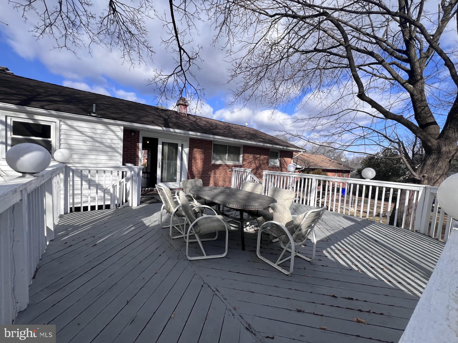 3620 Marlbrough Way College Park, MD 20740 - Photo 27 of 30 a view of a chairs and table on the wooden floor