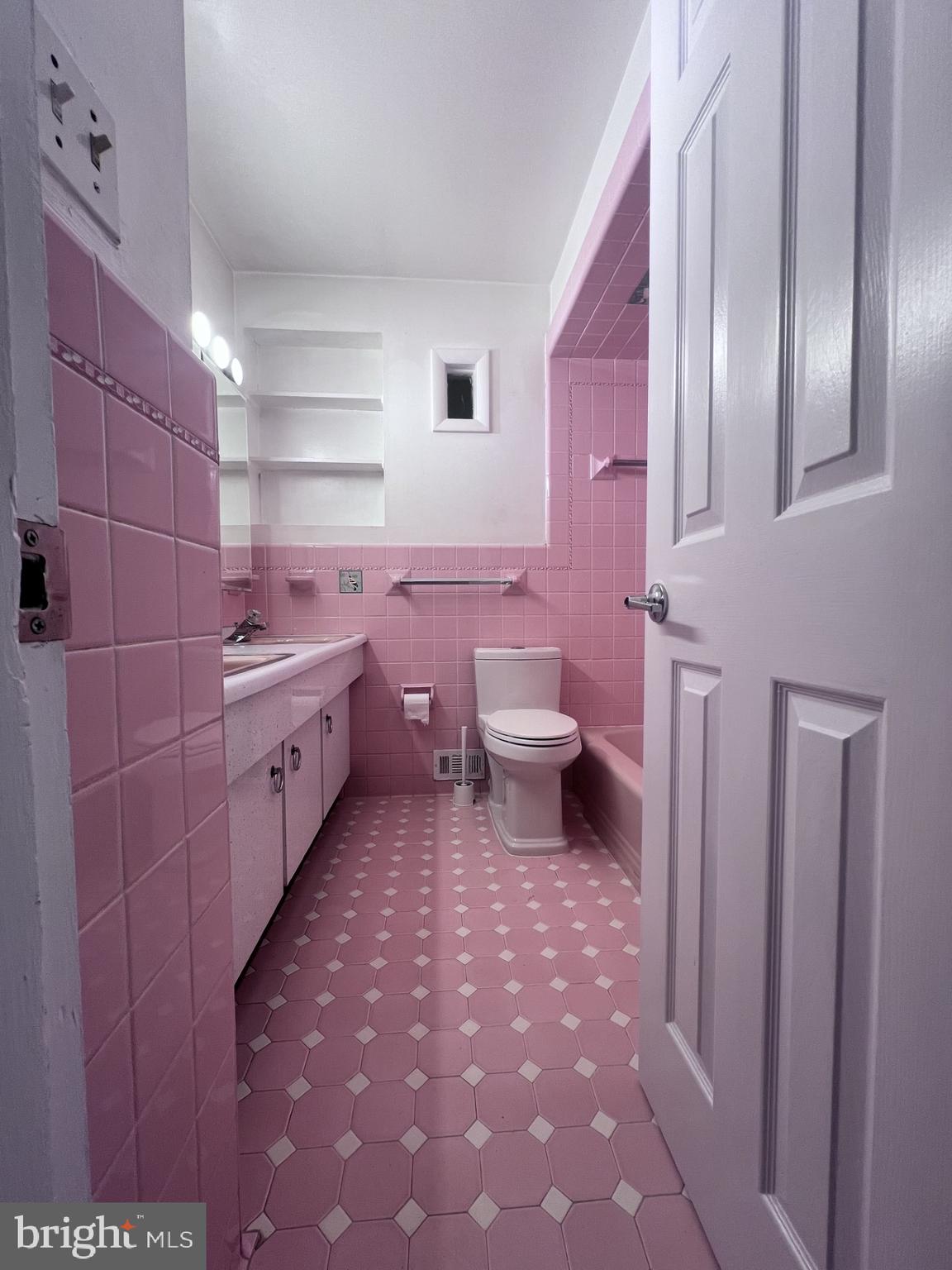 3620 Marlbrough Way College Park, MD 20740 - Photo 8 of 30 a bathroom with a sink a toilet and shower