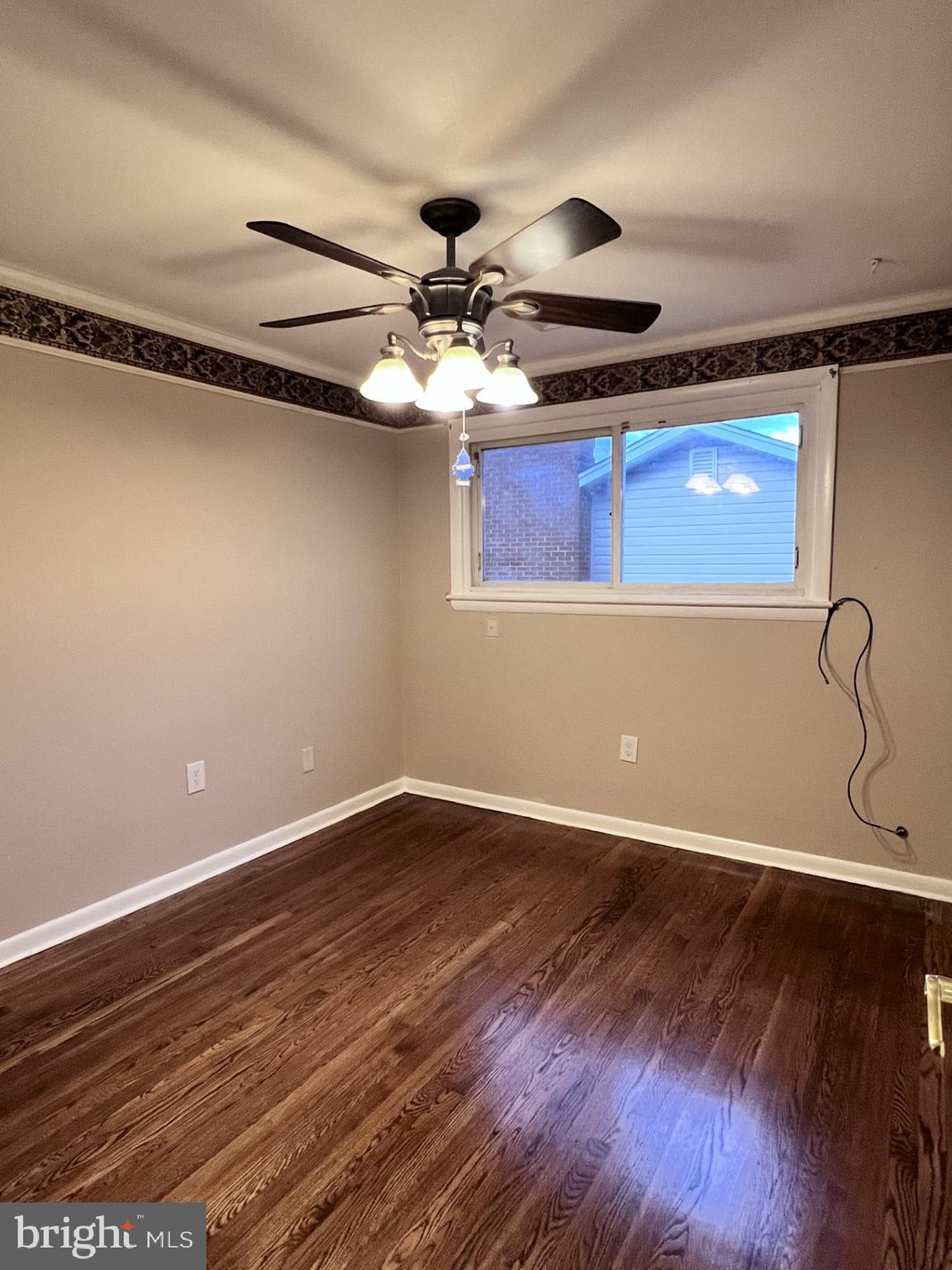 3620 Marlbrough Way College Park, MD 20740 - Photo 10 of 30 a view of a room with wooden floor and fan
