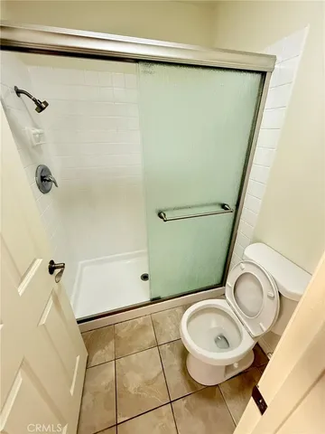 a view of a hallway to a hallway