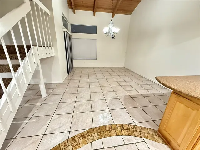 a kitchen with stainless steel appliances a sink and a stove