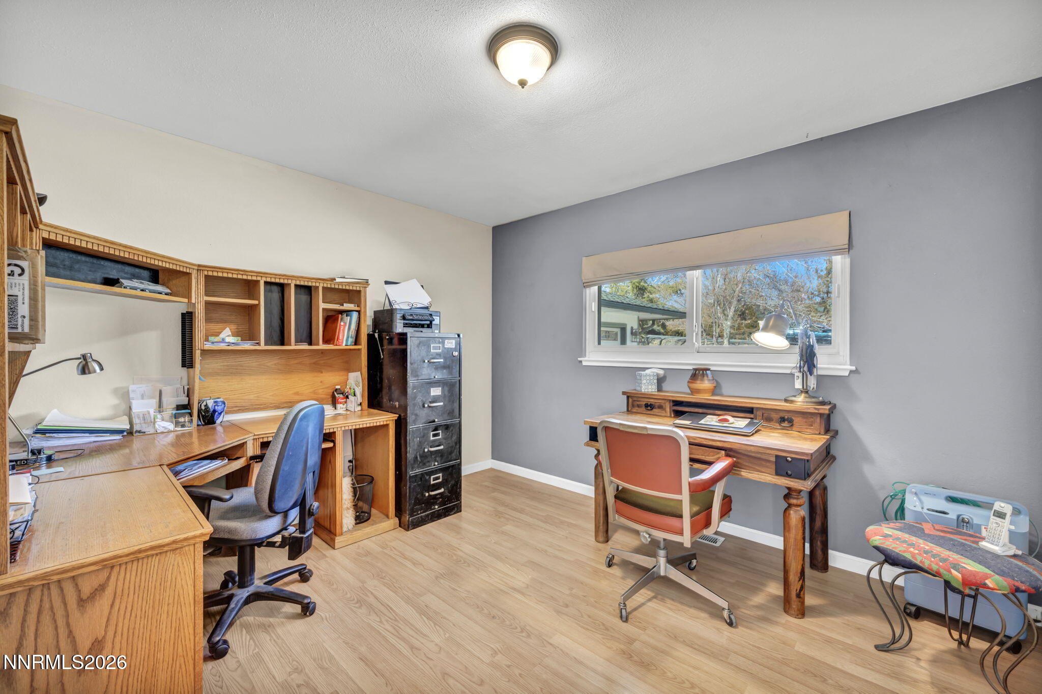 10200 Shiloh Drive Reno, NV 89508 - Photo 18 of 37 a view of a workspace with furniture and a window