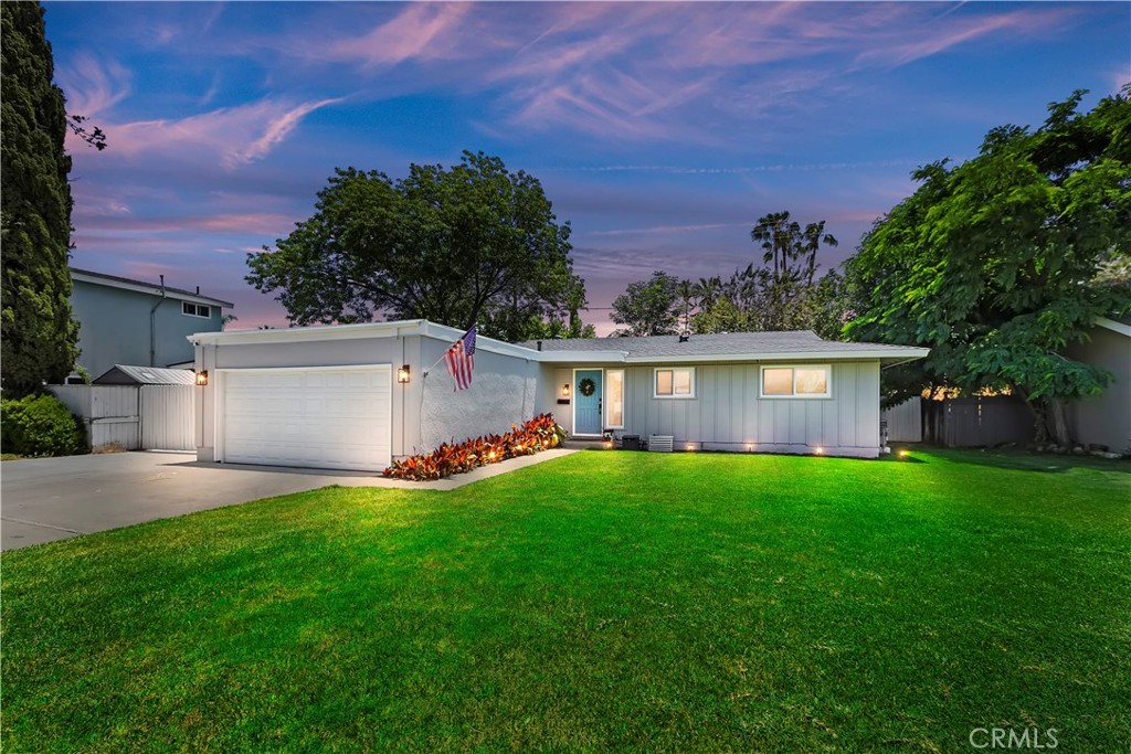 1014 West Rancho Road Corona, CA 92882 - Photo 1 of 1 front view of a house with a yard and a large tree