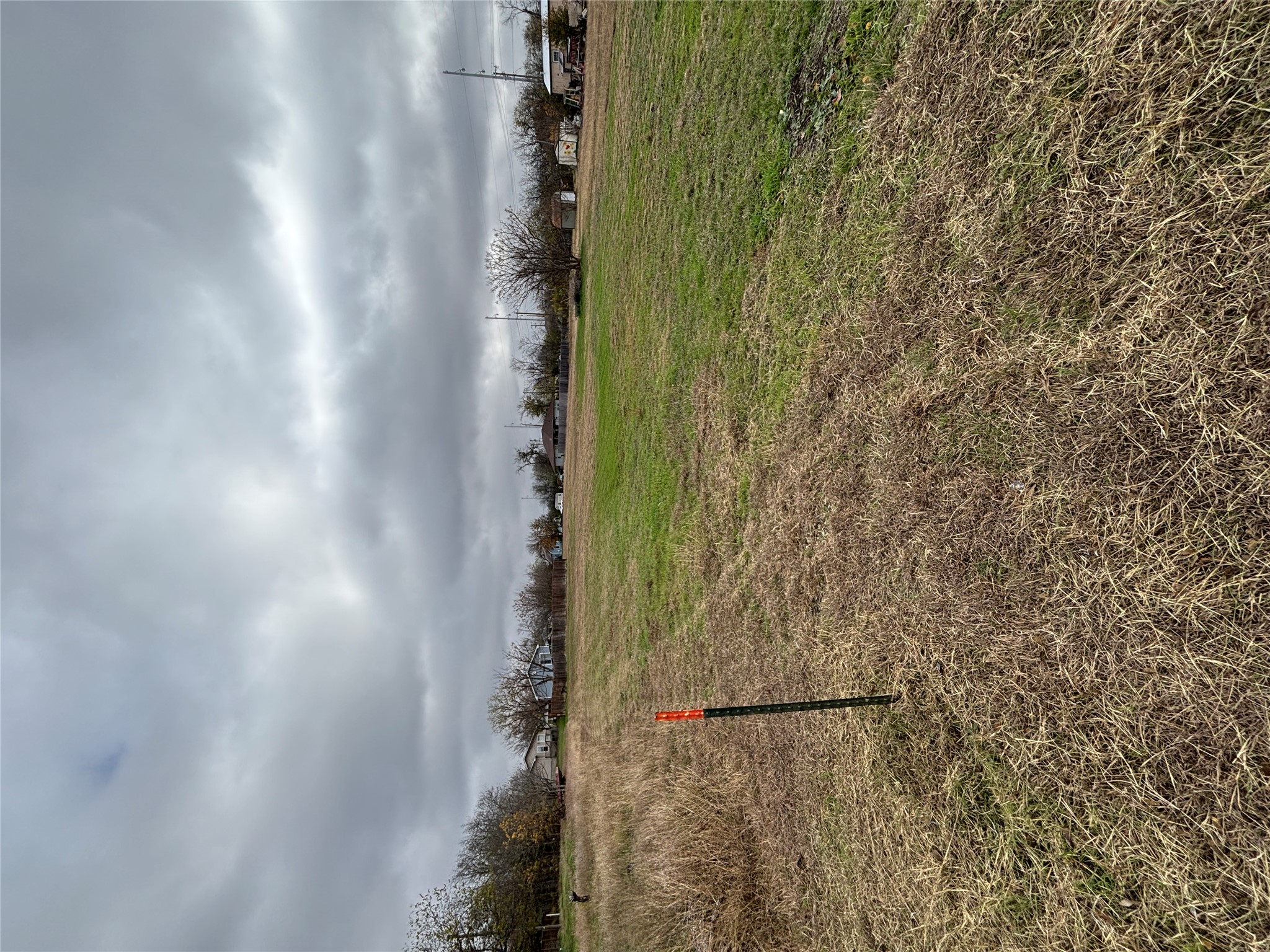 1302 Frink Street Taylor, TX 76574 - Photo 6 of 11 a view of a lake with a big yard