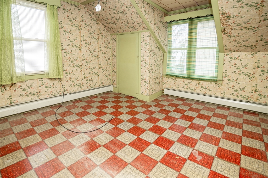 21 Park Street Webster, MA 01570 - Photo 14 of 38 a view of a bedroom with a window