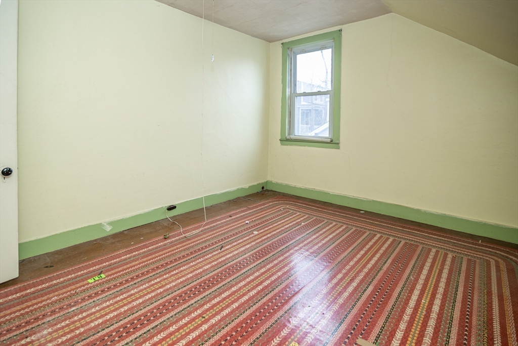 21 Park Street Webster, MA 01570 - Photo 16 of 38 a view of a room with wooden floor and windows