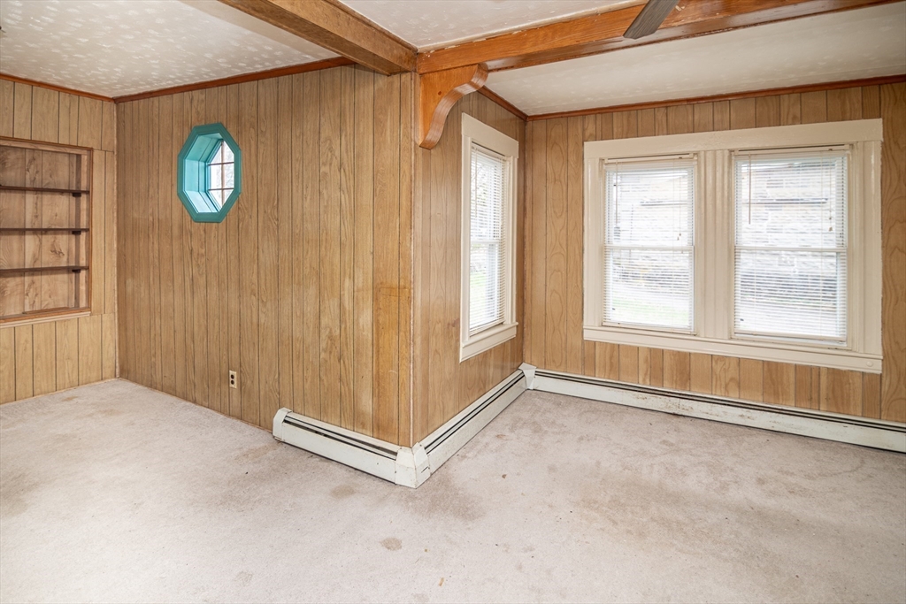 21 Park Street Webster, MA 01570 - Photo 24 of 38 an empty room with windows and entrance
