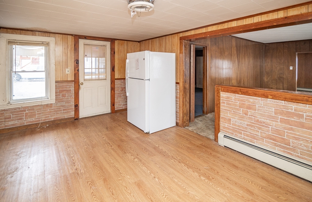 21 Park Street Webster, MA 01570 - Photo 3 of 38 a view of an empty room with a window