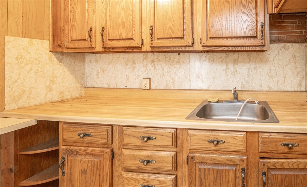 21 Park Street Webster, MA 01570 - Photo 31 of 38 a close view of sink and tap