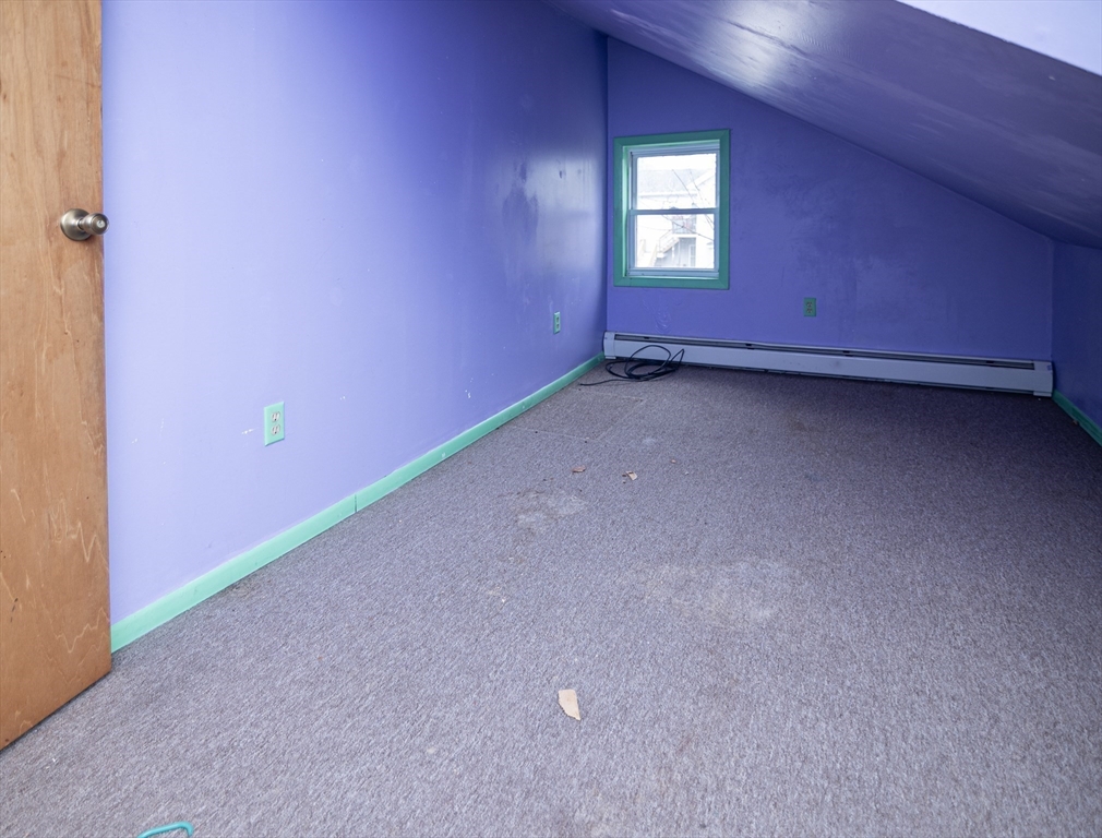 21 Park Street Webster, MA 01570 - Photo 33 of 38 an empty room with a window