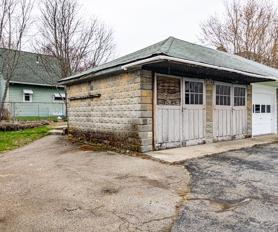 21 Park Street Webster, MA 01570 - Photo 35 of 38 a front view of a house with a yard