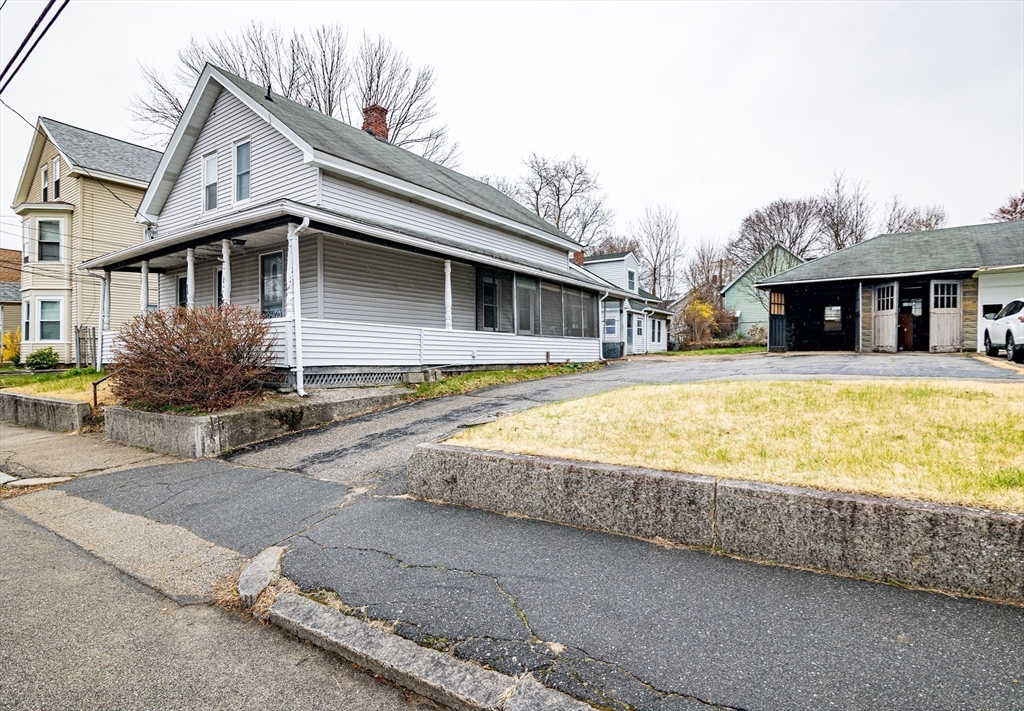 21 Park Street Webster, MA 01570 - Photo 37 of 38 a view of a house with snow on the road